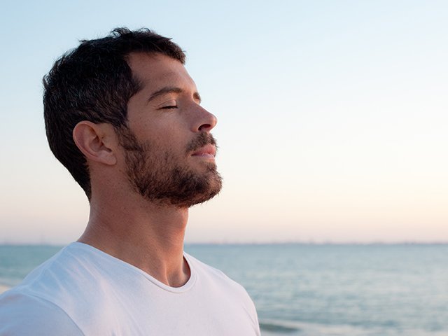 heart-breathing-man-on-beach