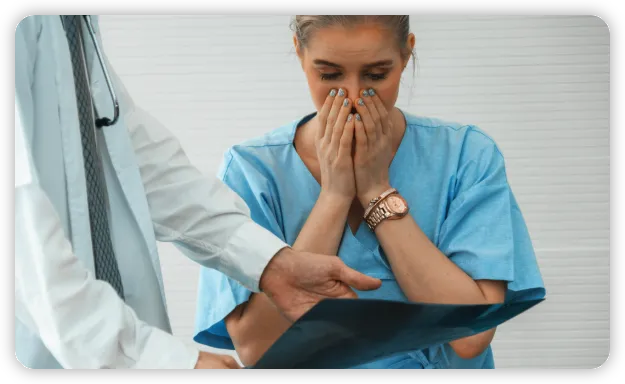 A medical patient looking surprised at her medical report